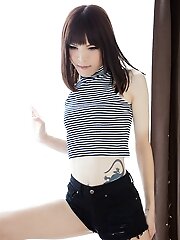 Slim Japanese tgirl Yui Kawai shows her little cock